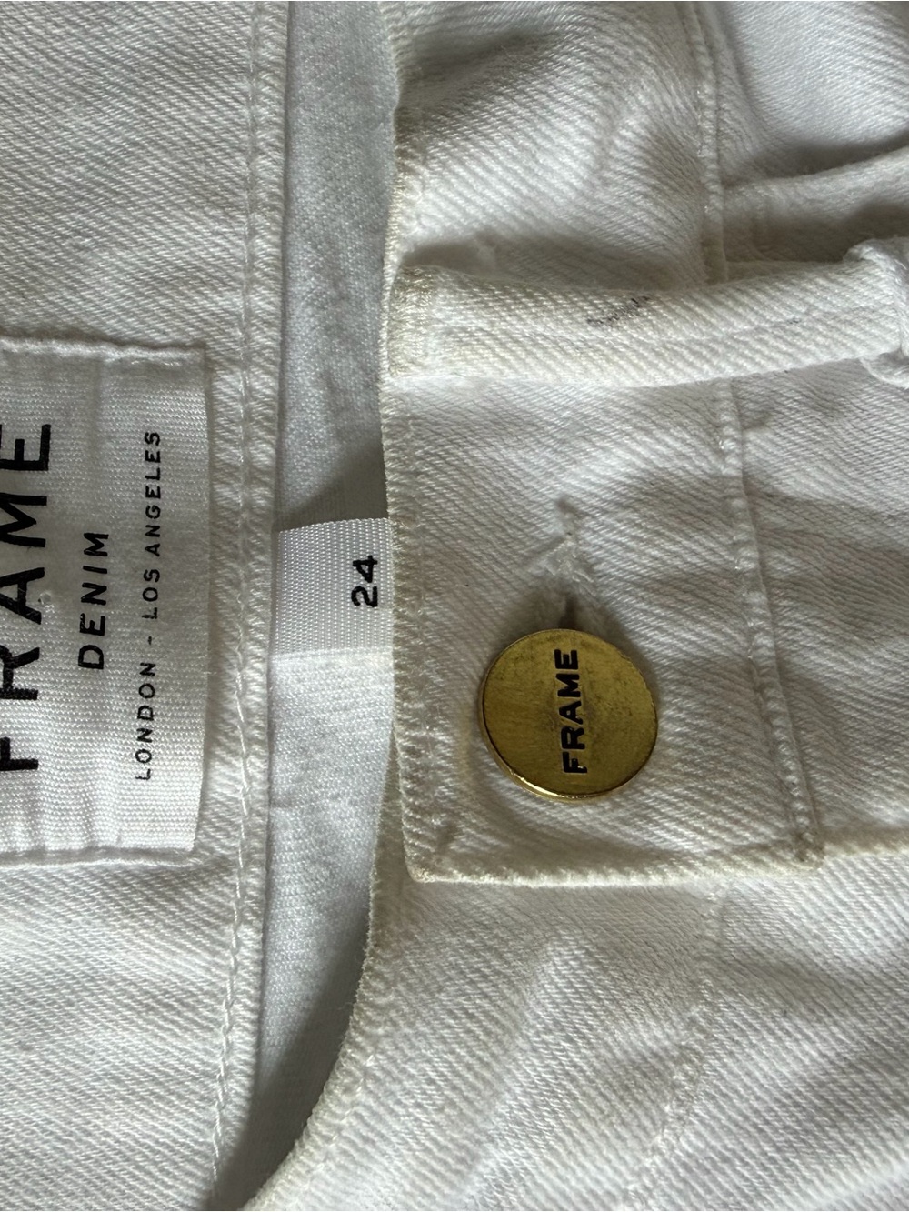 Frame Denim White Skinny Jeans with Gold Button